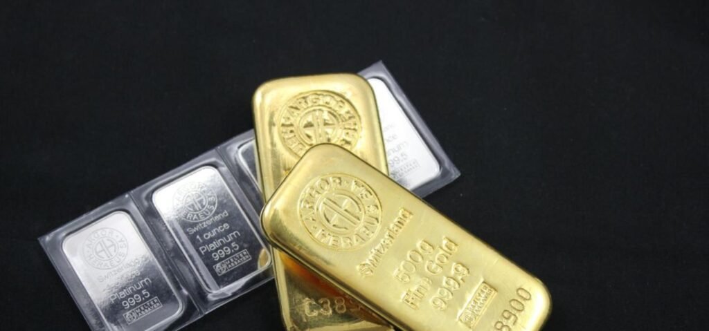 Gold and platinum bars representing gold investment options in Pakistan