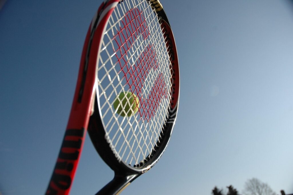 Tennis ball and racket representing the Wimbledon 2026 championship run