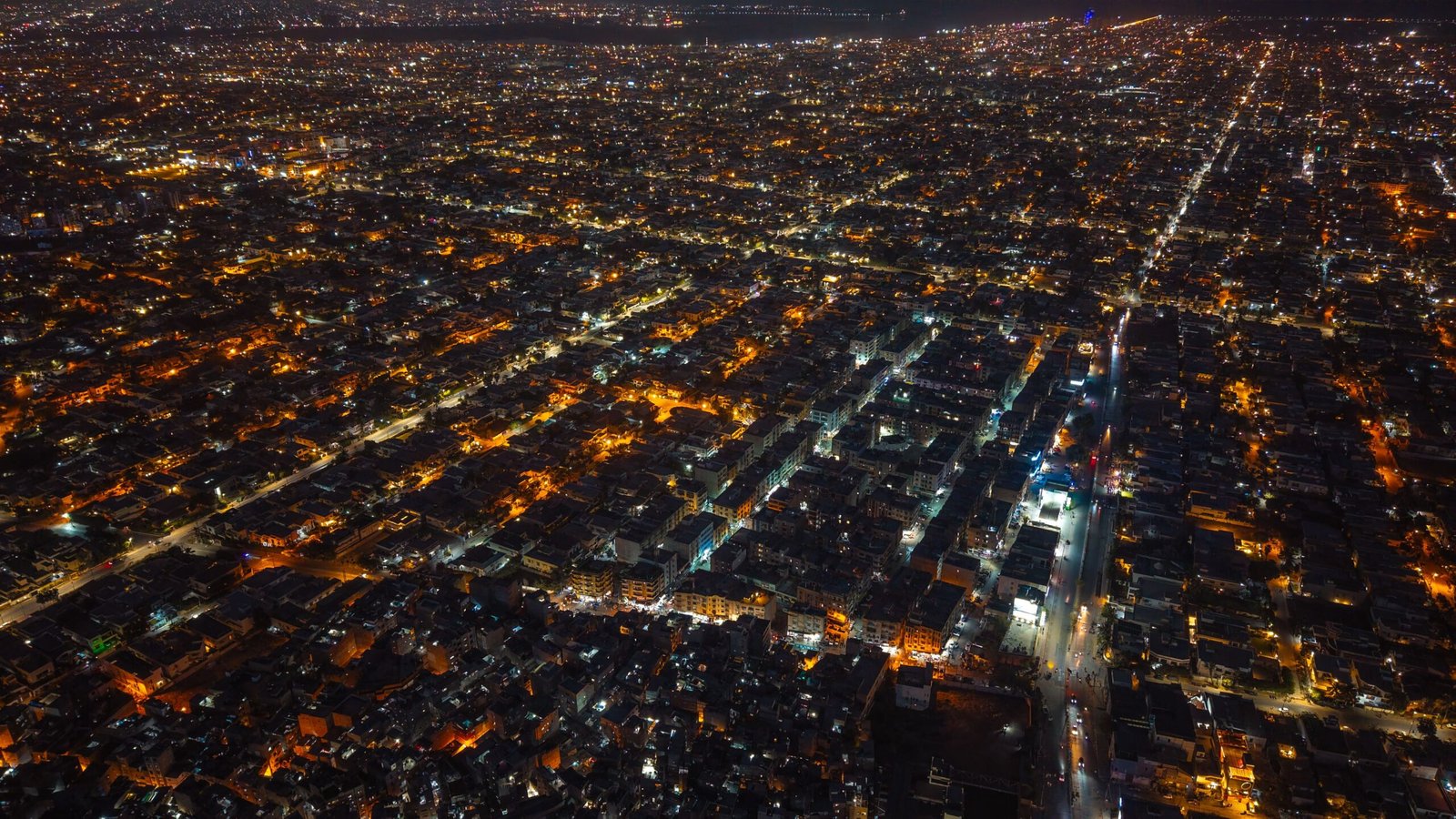Apna Ghar Scheme Rs307 Billion housing finance growth reflected in Karachi's illuminated night skyline
