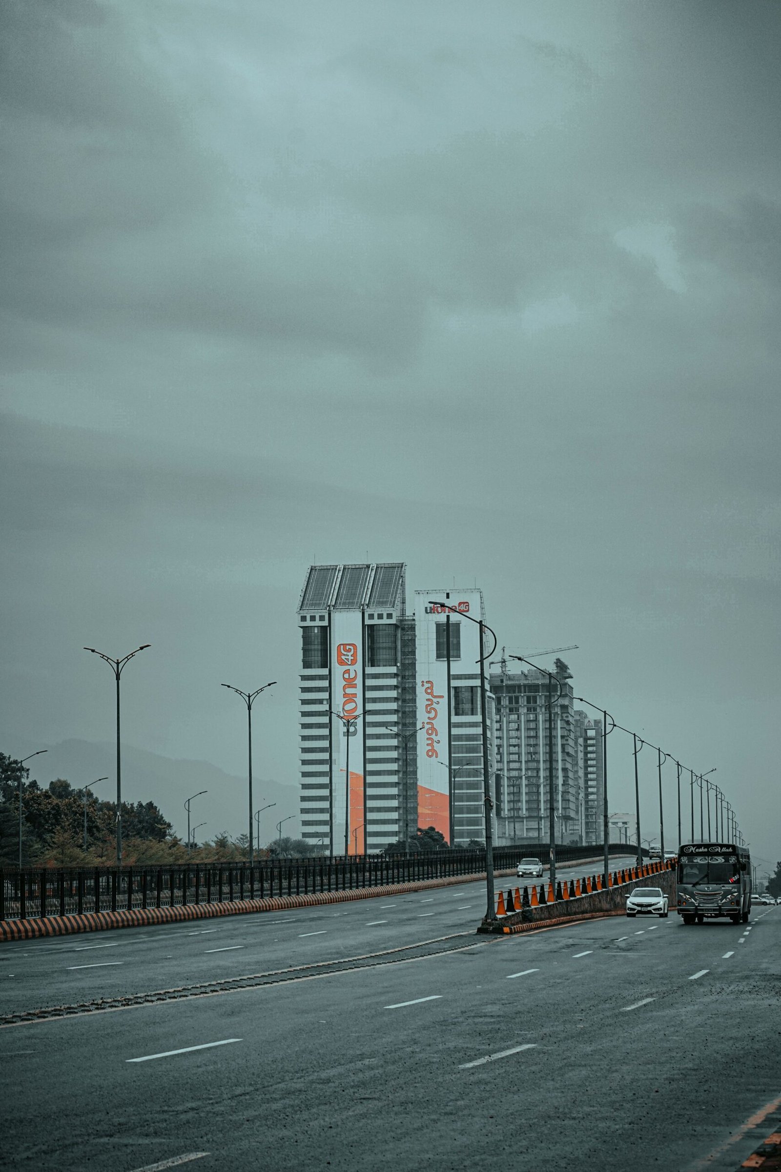 CDA new housing scheme rules Islamabad ki buildings aur highway ka manzar