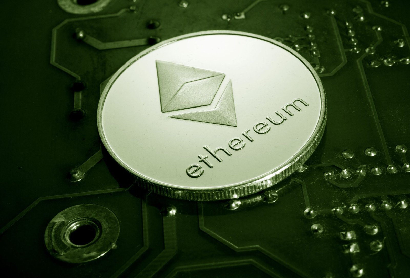 Ethereum ETF inflows record 2026 shown through a close-up Ethereum coin on a circuit board