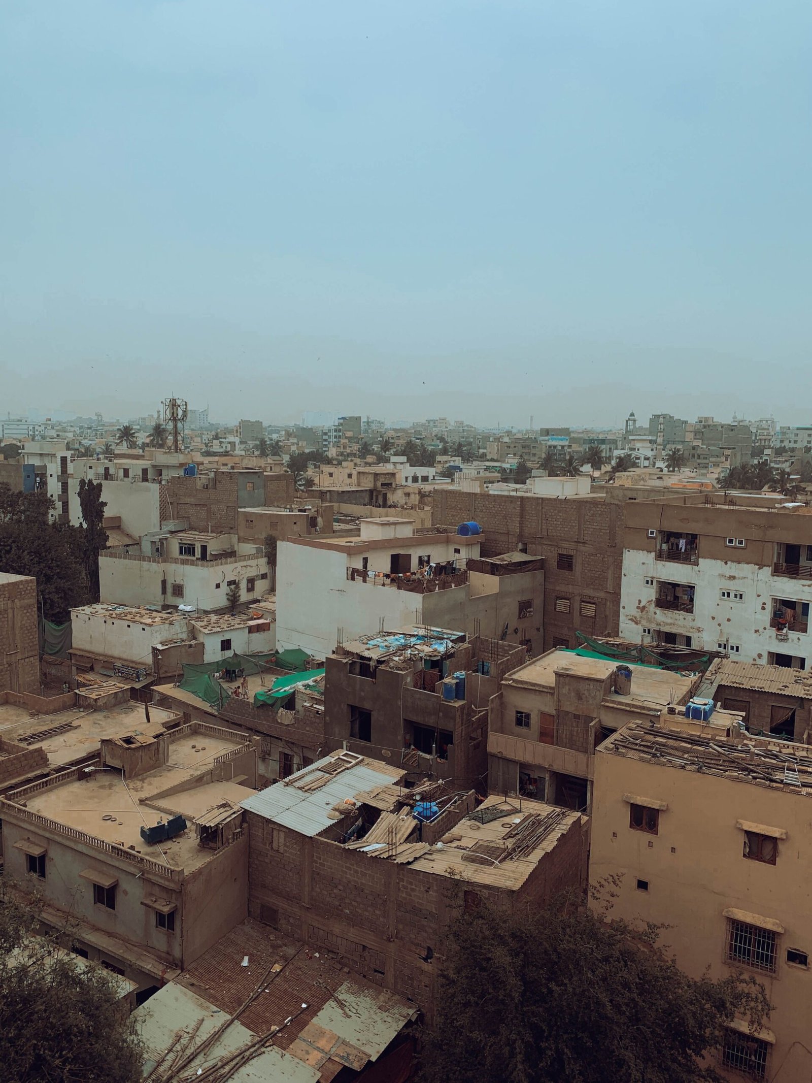 Aerial view of residential plots and housing society buildings in Karachi, Pakistan