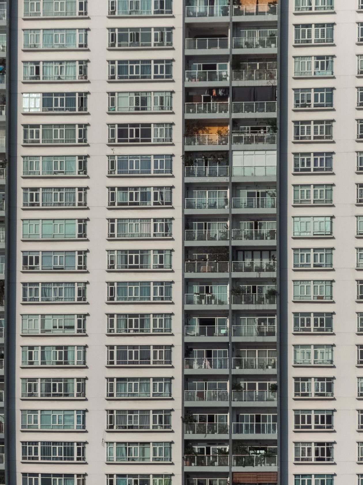 Exterior of a modern apartment building that could be part of a future tokenized property investment in Pakistan