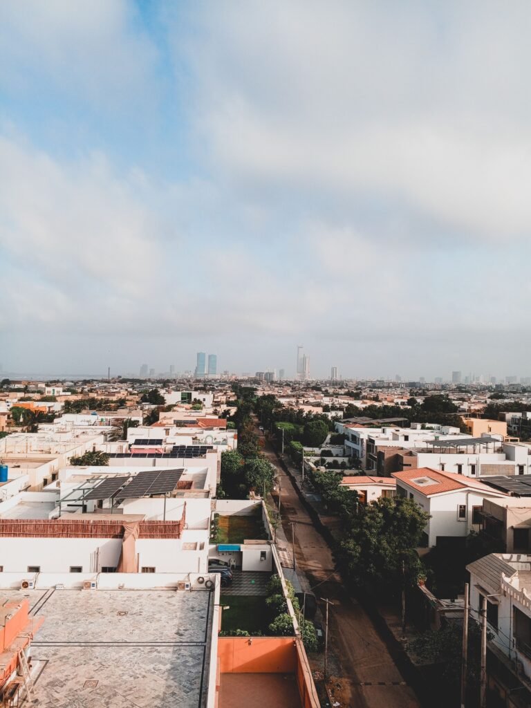 Aerial view of residential homes and the DHA Karachi skyline