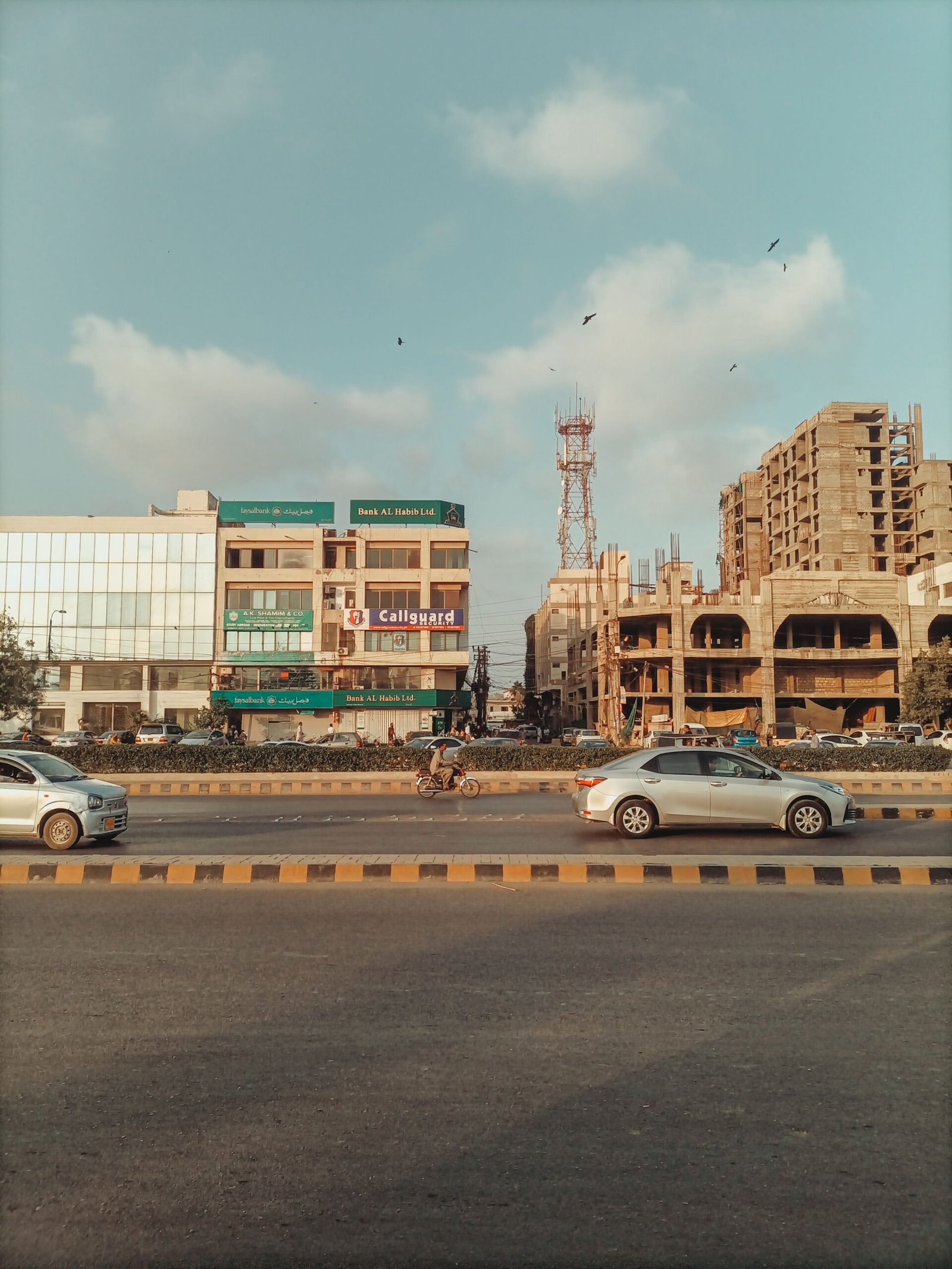 Urban street with construction and office buildings representing Pakistan's growing business districts