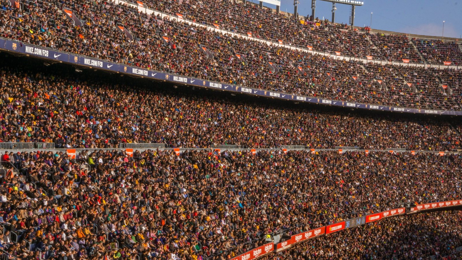 Premier League transfer spending record shown through a packed football stadium crowd
