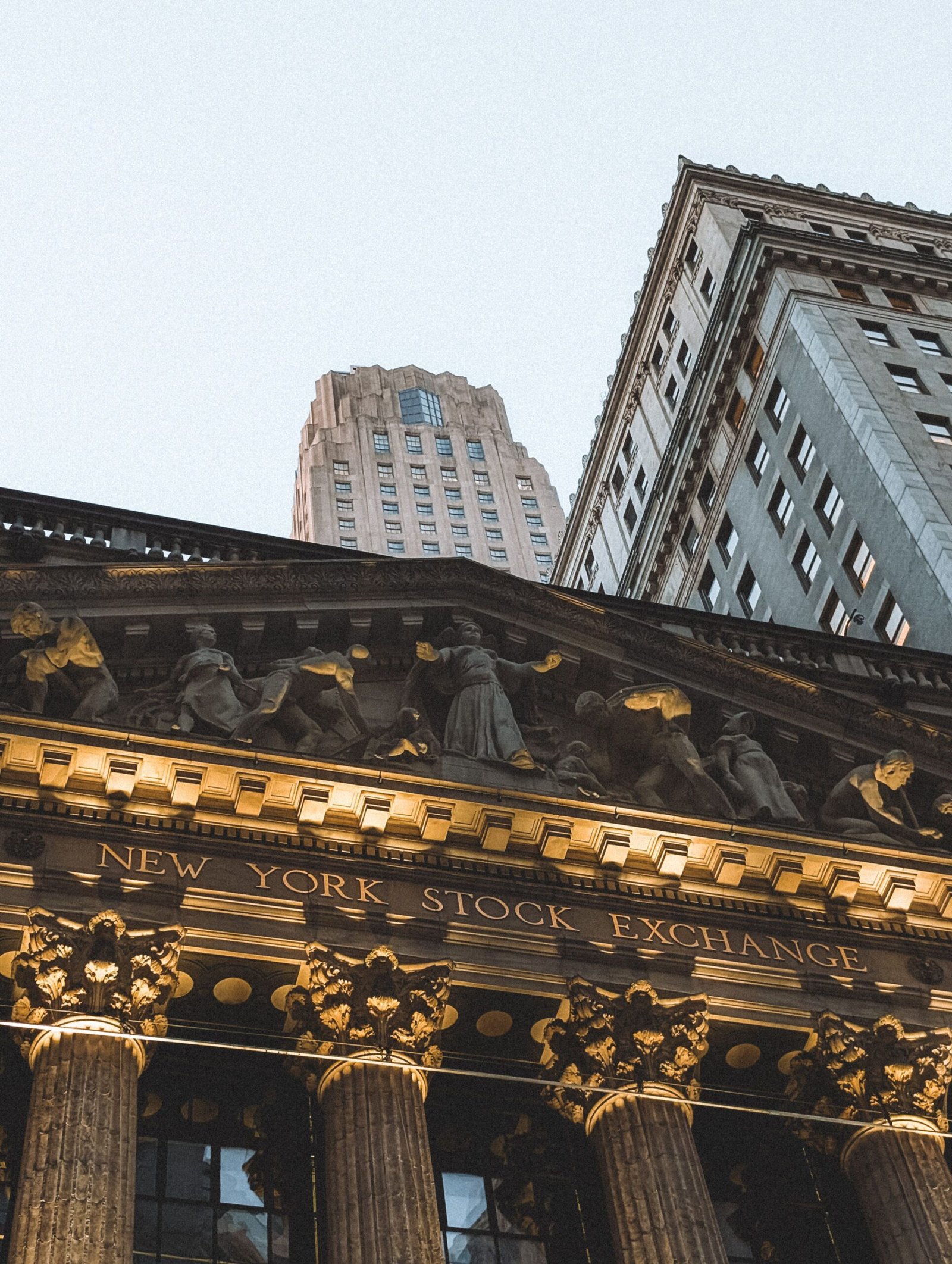 Exterior of a stock exchange building representing equity markets