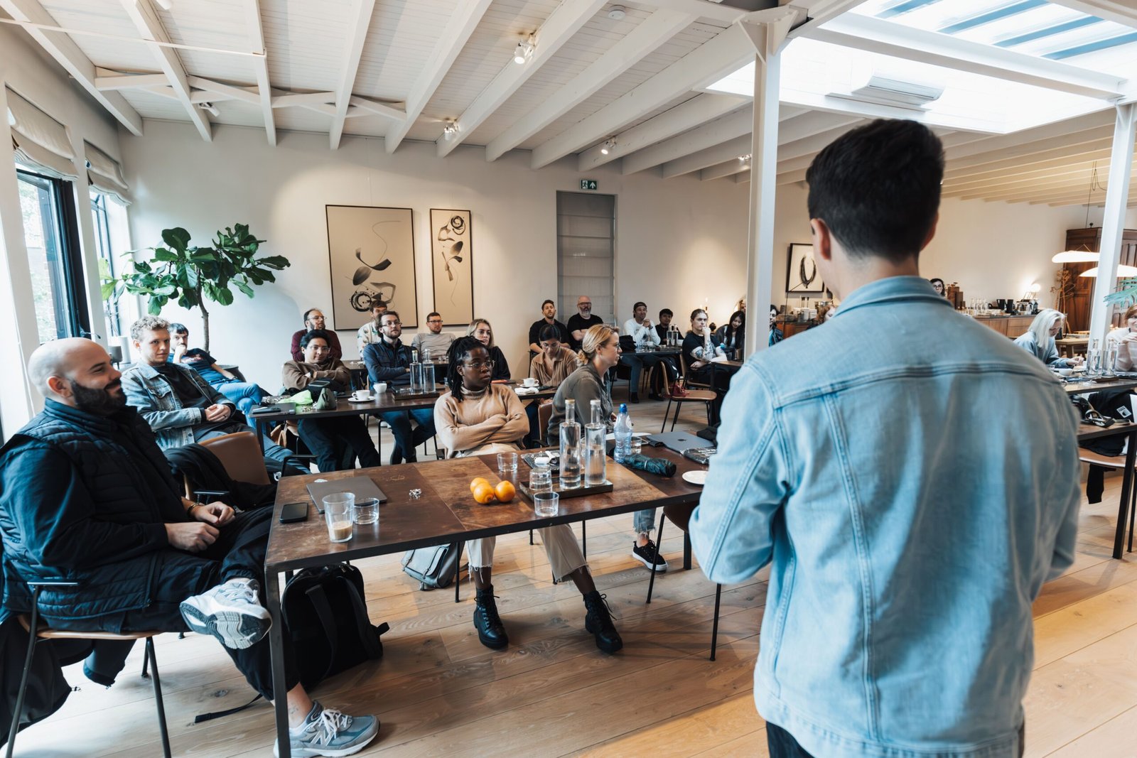 Investors reviewing a startup pitch and financial documents in a venture capital meeting